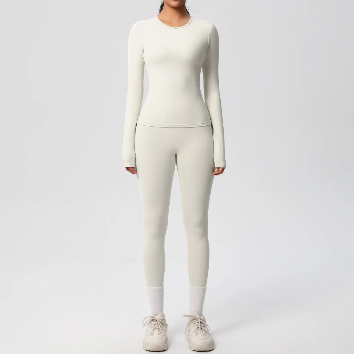 Tvådelat Träningsset för Dam – Långärmad Crop Top och Höga Midjeleggings