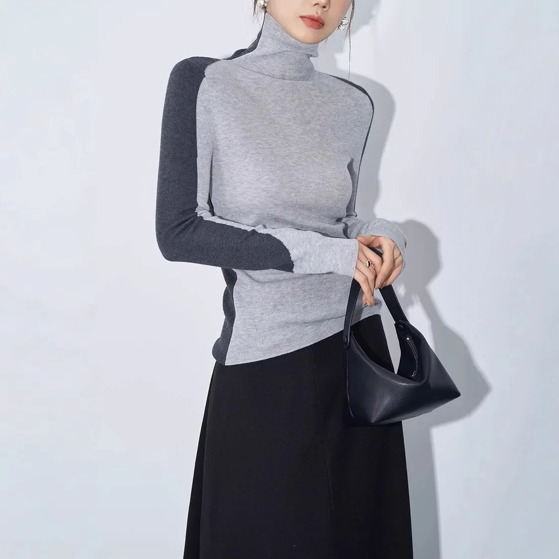 Topp med kontrasterande ärm och falsk halsringning 0